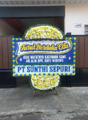 Papan Bunga Duka di Silau Laut