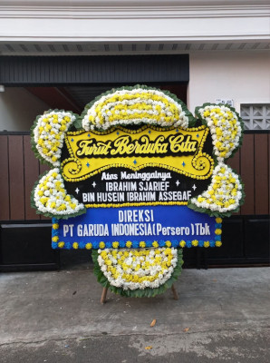 Papan Bunga Duka di Silau Laut