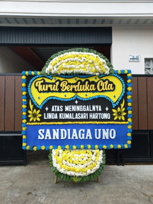 Papan Bunga Duka di Silau Laut